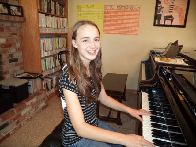 Studio with pianos and students